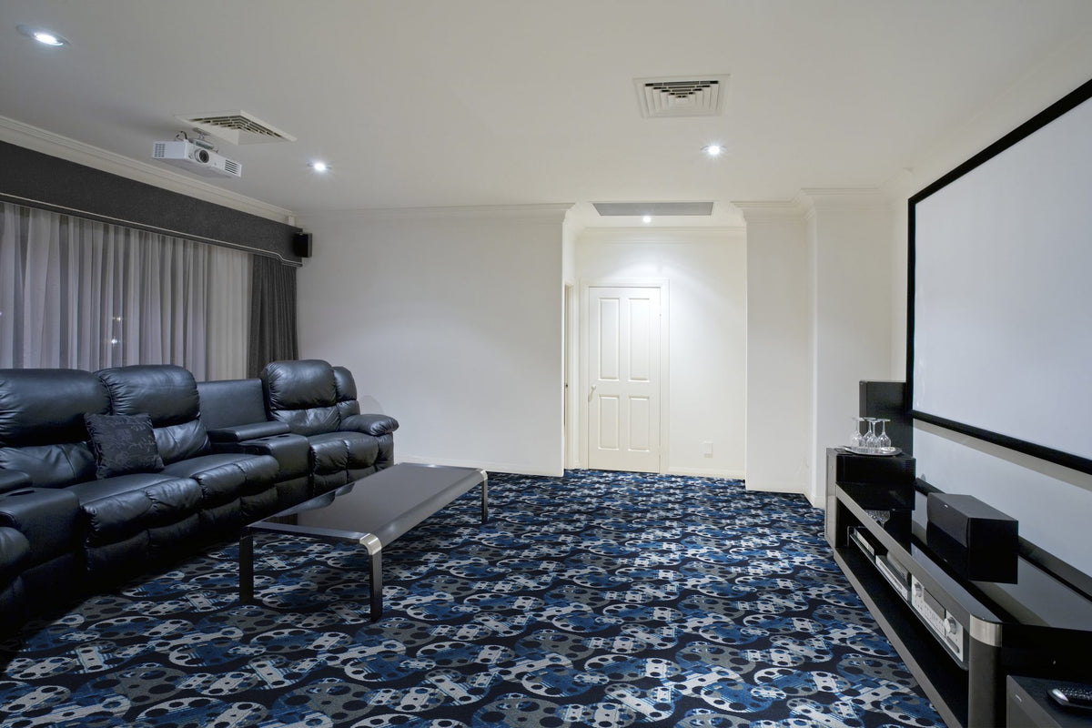 Reeling home theater carpet in Slate shown across a theater floor