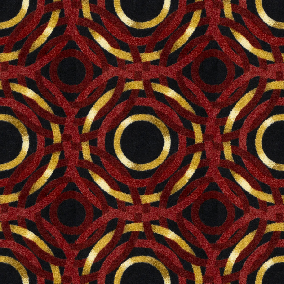 Mayfair home theater carpet in Ruby — interlocking circle pattern detail